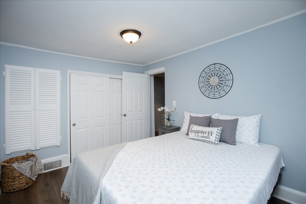 30 Eleanor Street Chelsea, MA 02150 - Photo 12 of 23 a bedroom with a bed and a window