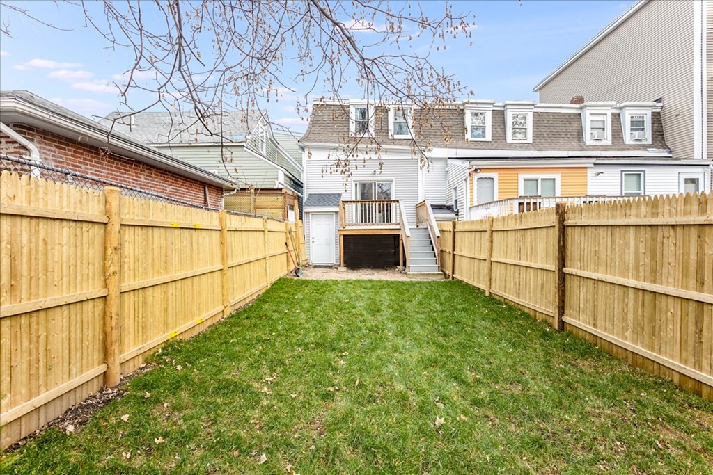 30 Eleanor Street Chelsea, MA 02150 - Photo 22 of 23 a view of a brick house with a large window