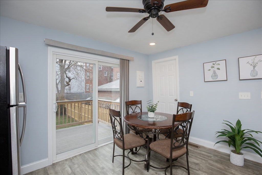 30 Eleanor Street Chelsea, MA 02150 - Photo 9 of 23 a view of a dining room with furniture window and wooden floor
