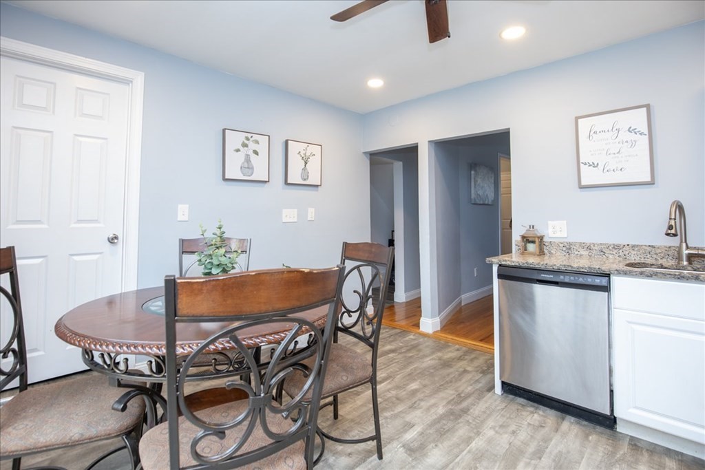 30 Eleanor Street Chelsea, MA 02150 - Photo 10 of 23 a view of a dining room with furniture and wooden floor
