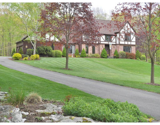 788 Ridge Road Wilbraham, MA 01095 - Photo 1 of 1 a view of a big house with a big yard and large trees