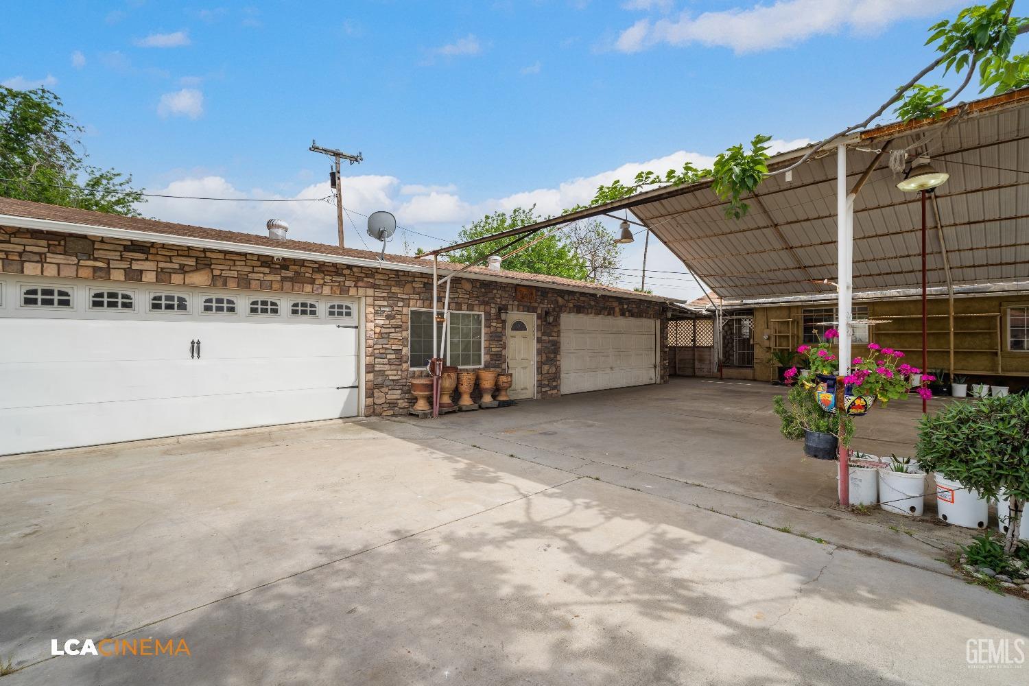 Undisclosed Address Bakersfield, CA 93307 - Photo 7 of 18 a view of a garage