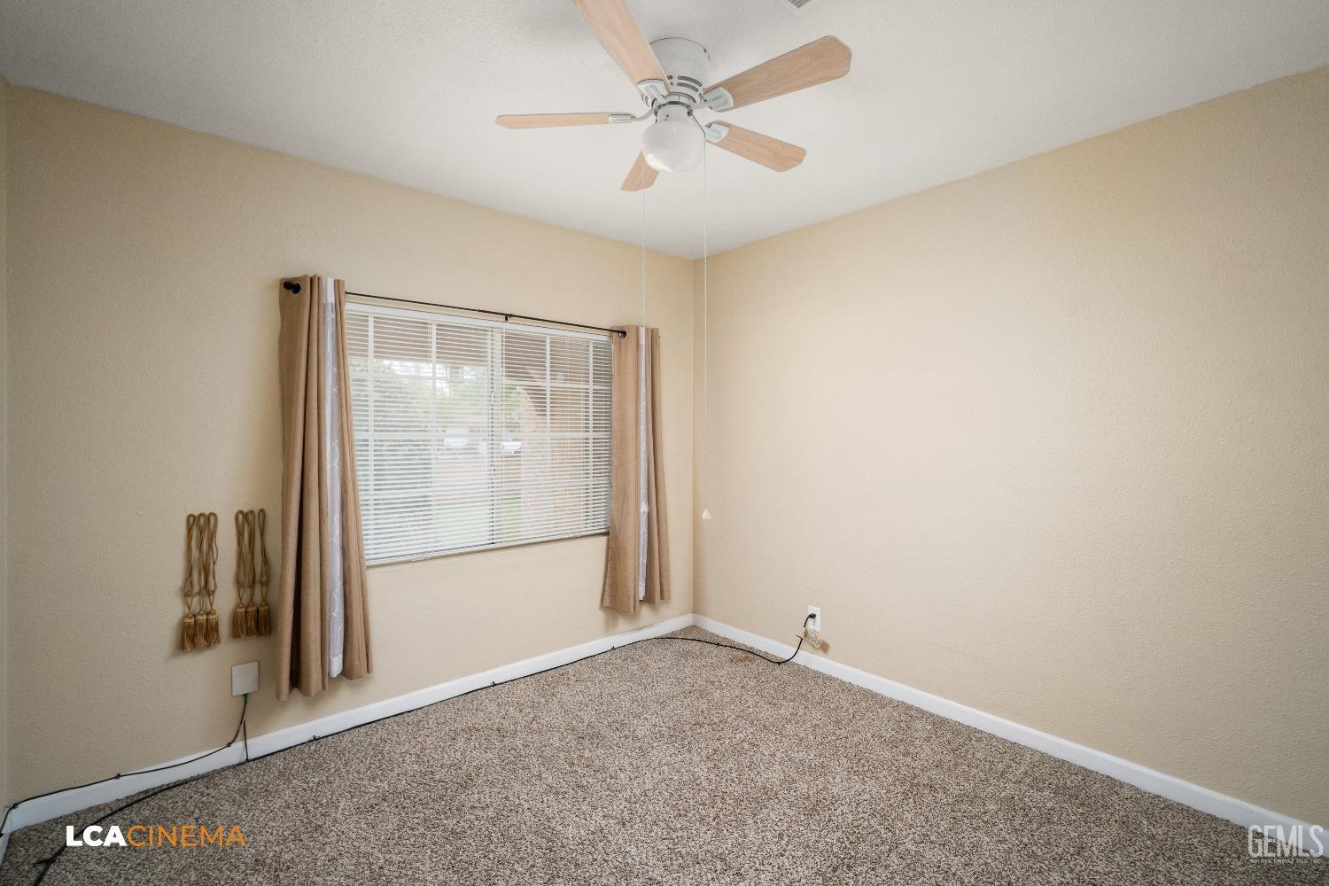 Undisclosed Address Bakersfield, CA 93307 - Photo 10 of 18 an empty room with windows and closet