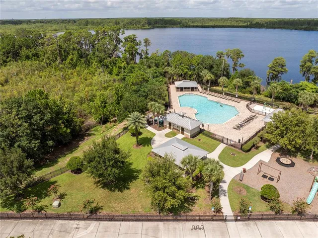 a view of entryway with wooden floor and stairs