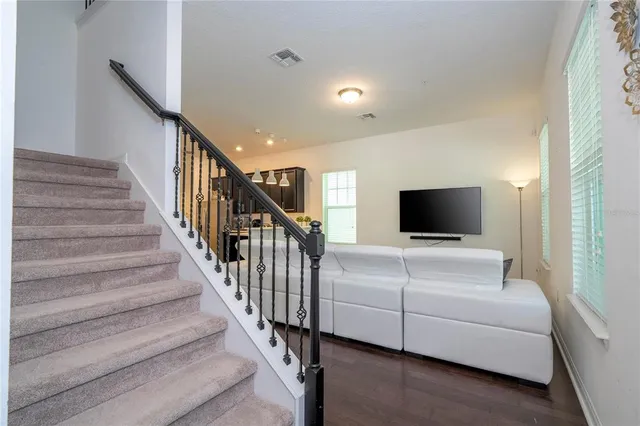 a bathroom with a sink toilet and mirror
