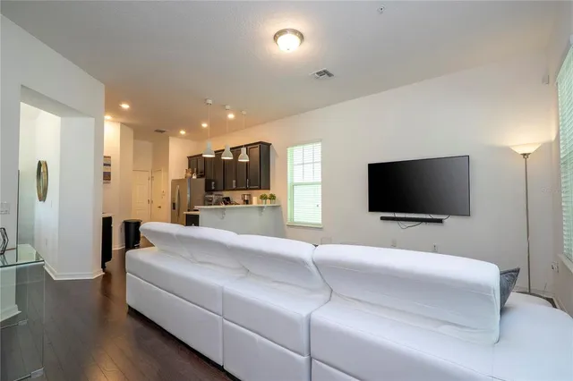 a stove top oven sitting inside of a kitchen