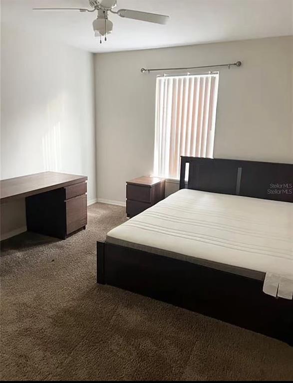 2360 Southwest Archer Road, Unit 602 Gainesville, FL 32608 - Photo 2 of 4 a bedroom with a bed and window