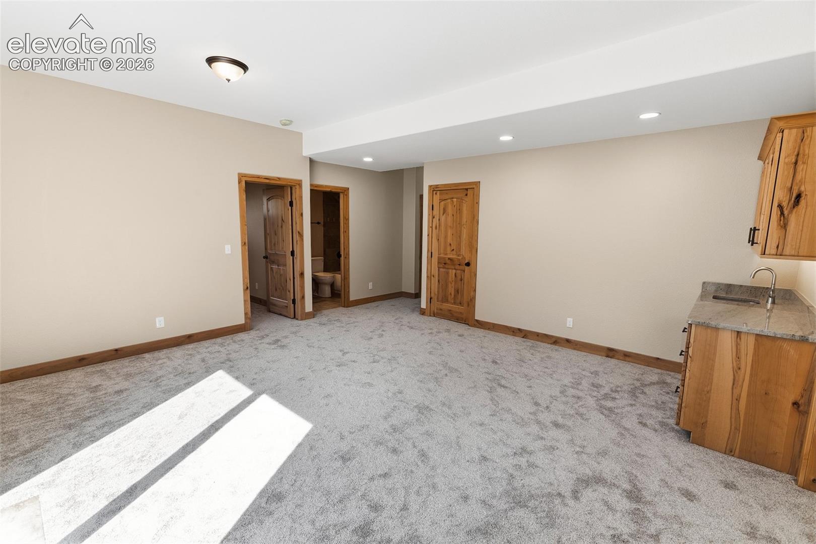 748 Pinewood Road Florissant, CO 80816 - Photo 32 of 37 Lower Level Family Room
