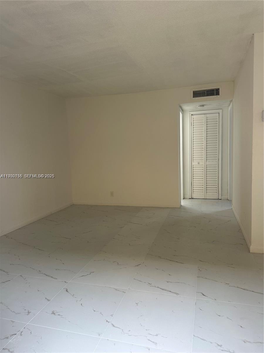 1733 Mayo Street, Unit 2 Hollywood, FL 33020 - Photo 6 of 10 an empty room