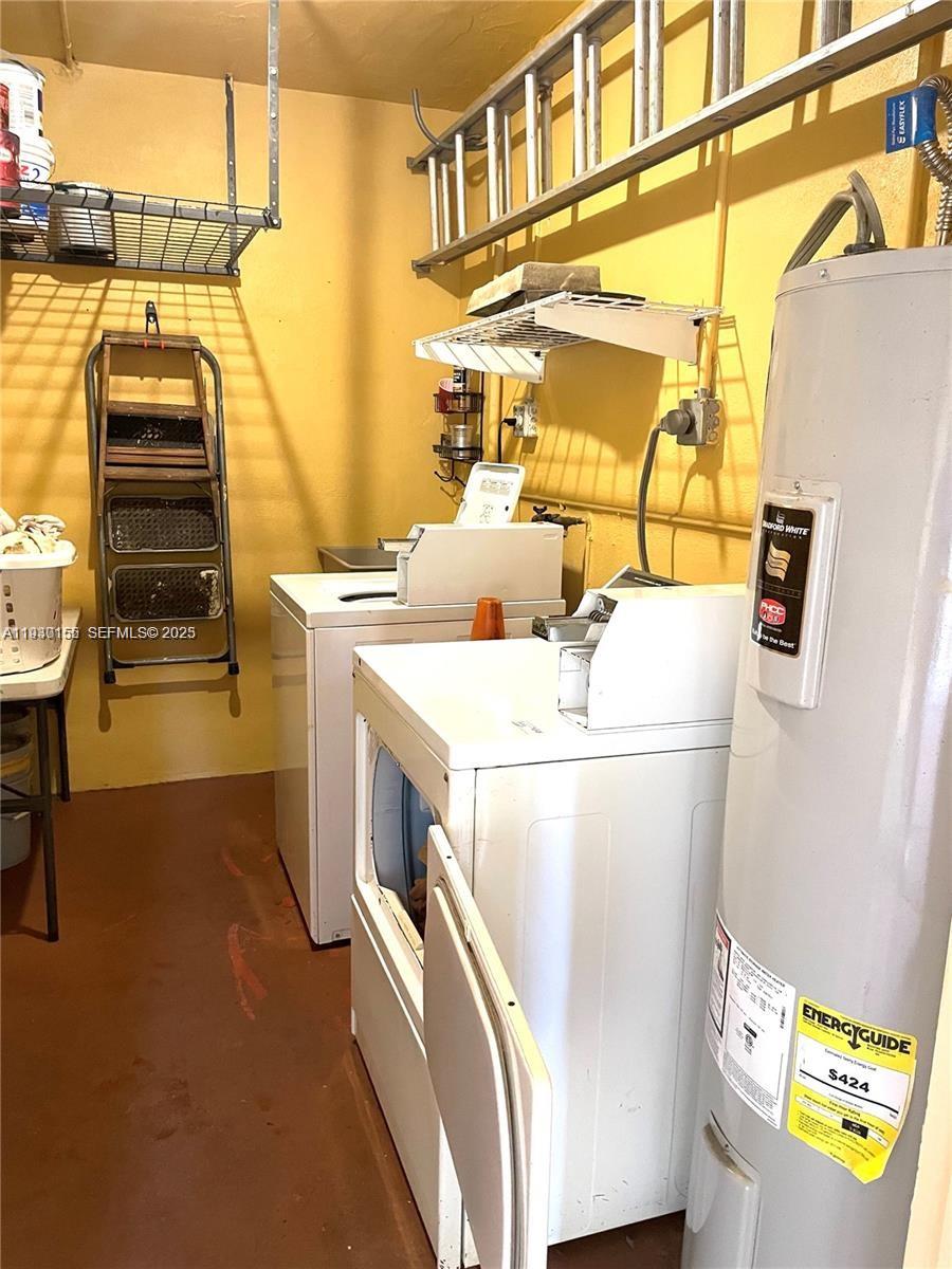 1733 Mayo Street, Unit 2 Hollywood, FL 33020 - Photo 10 of 10 a utility room with dryer and washer