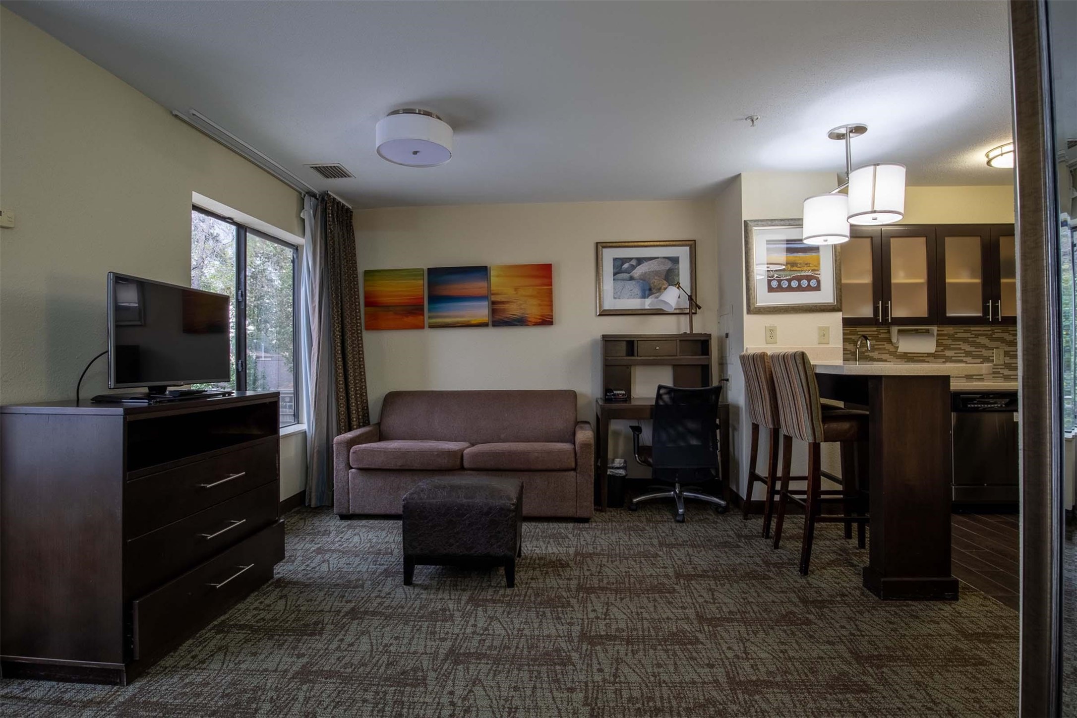 18828 Highway 249, Unit 124 Houston, TX 77070 - Photo 25 of 49 a living room with furniture and a flat screen tv