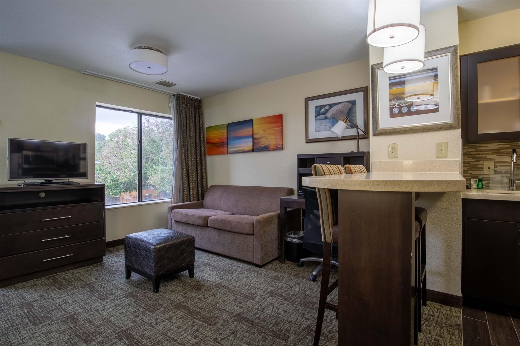 18828 Highway 249, Unit 124 Houston, TX 77070 - Photo 42 of 49 a living room with furniture and a flat screen tv