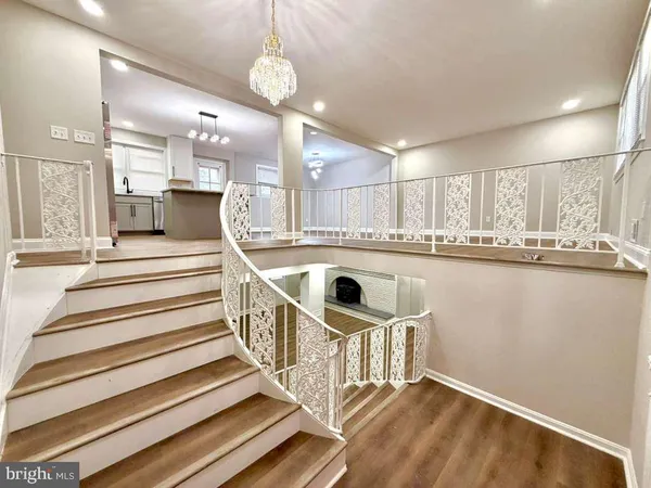 a close view of fireplace and a wooden floor