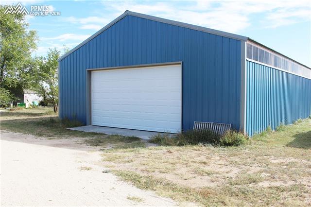 30x40 detached garage/storage.  18' door.  Big enough for 4 cars!