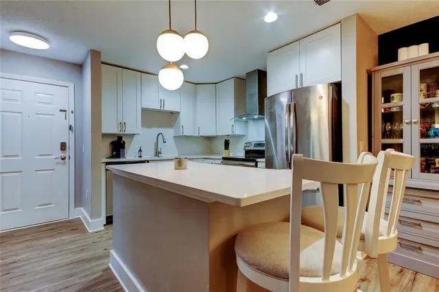 a living room with furniture and a couch