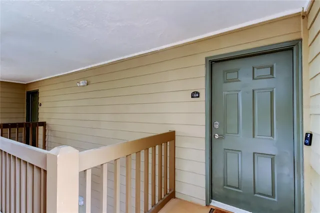 a view of a swimming pool with lounge chairs