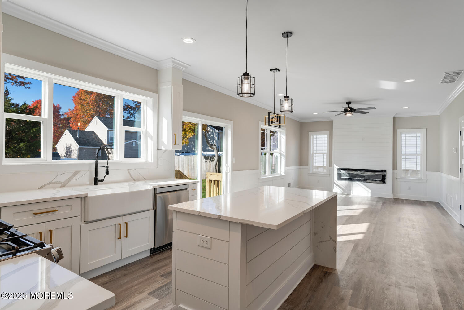 181 Bowline Road Manahawkin, NJ 08050 - Photo 4 of 17 a large kitchen with kitchen island a large counter space a sink stainless steel appliances and cabinets