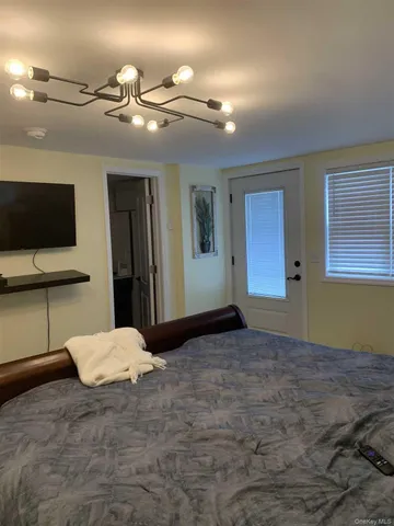 a view of a livingroom with furniture