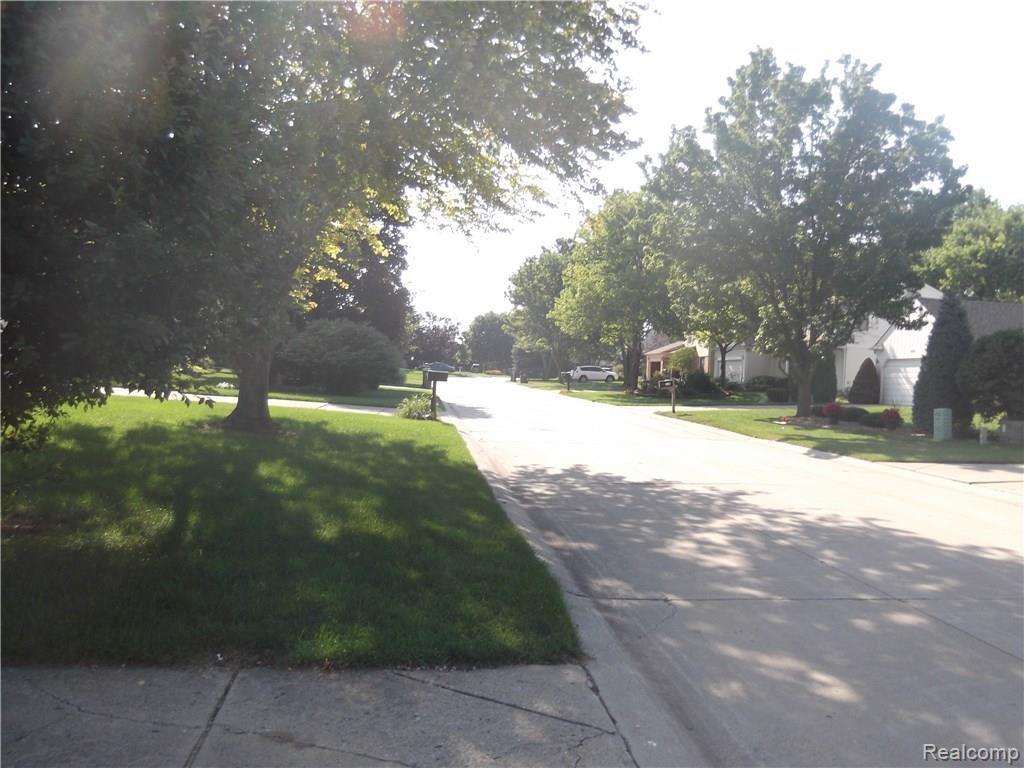 368 Dalton Drive Rochester, MI 48307 - Photo 3 of 25 Beautiful tree lined street with mature trees!