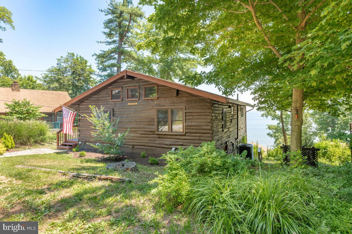 2144 Cedar Road Port Republic, MD 20676 - Photo 10 of 56 a backyard of a house with lots of green space