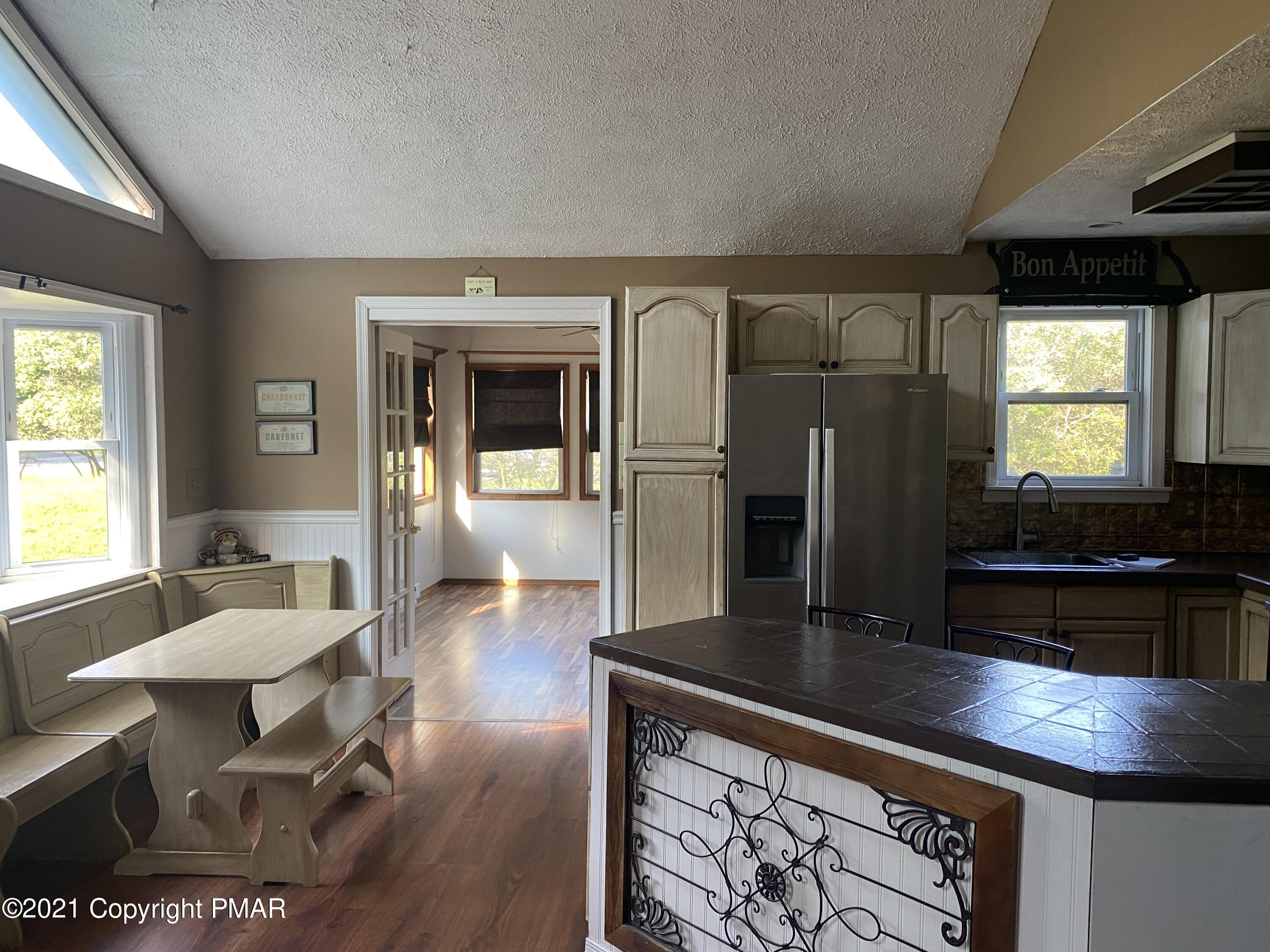 194 Ryan Road Blakeslee, PA 18610 - Photo 36 of 43 a living room with furniture and a wooden floor