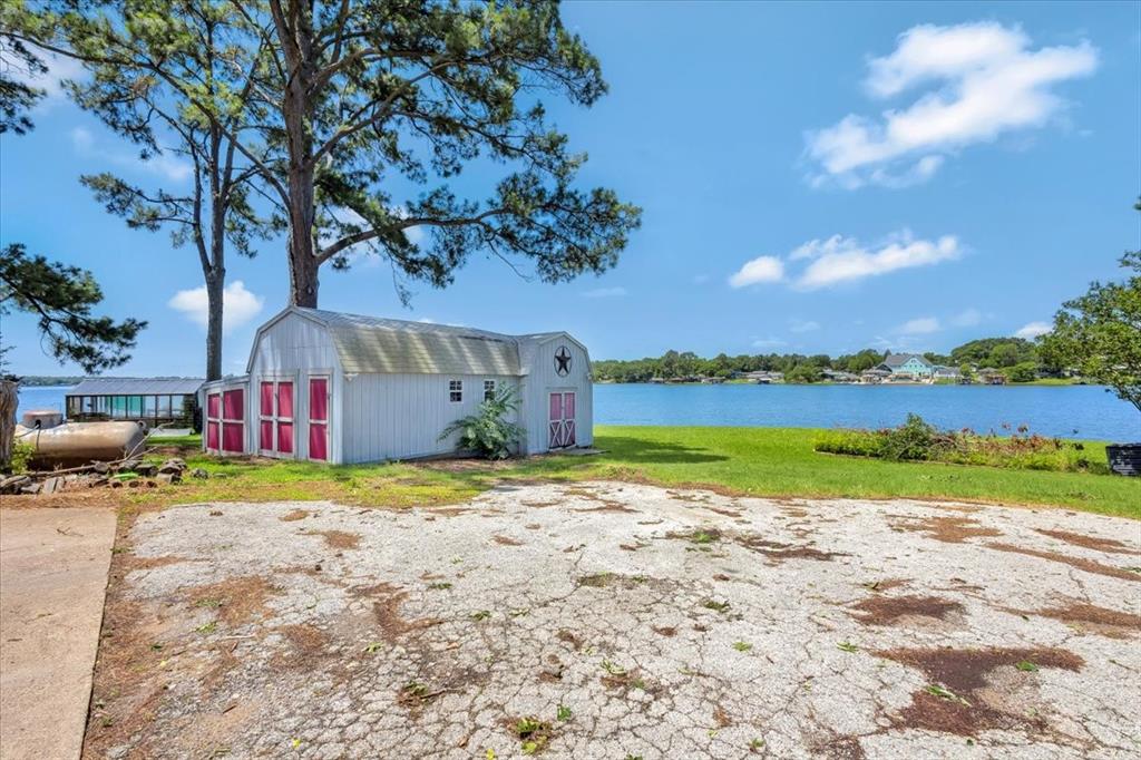 6903 Scott Street Eustace, TX 75124 - Photo 14 of 32 a view of a house with outdoor space and lakeside