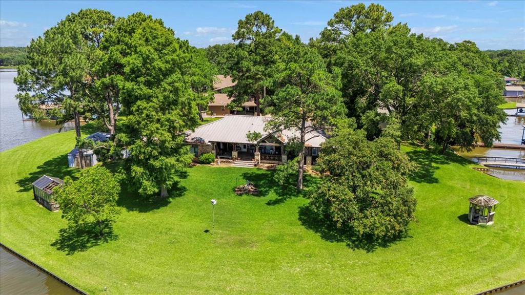 6903 Scott Street Eustace, TX 75124 - Photo 2 of 32 a view of a chair and table in the garden