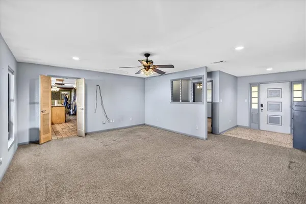 a view of a livingroom with a staircase