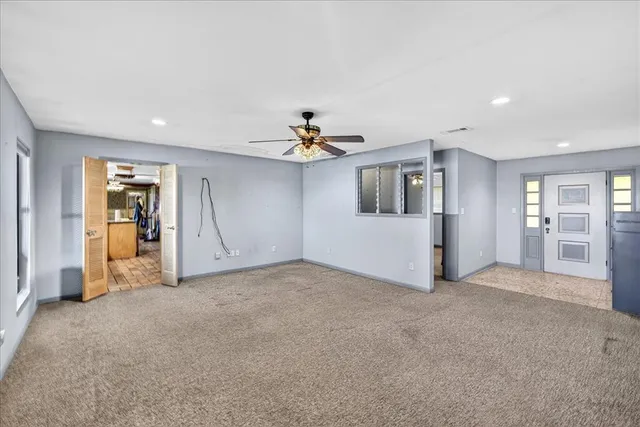 a view of a livingroom with a staircase