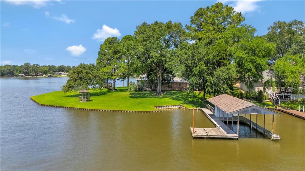 6903 Scott Street Eustace, TX 75124 - Photo 3 of 32 a view of a swimming pool with a patio