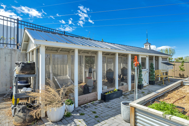 1720 Hillcrest Circle Mapleton, UT 84664 - Photo 108 of 116 View of patio featuring a sunroom, an outbuilding, and exterior structure