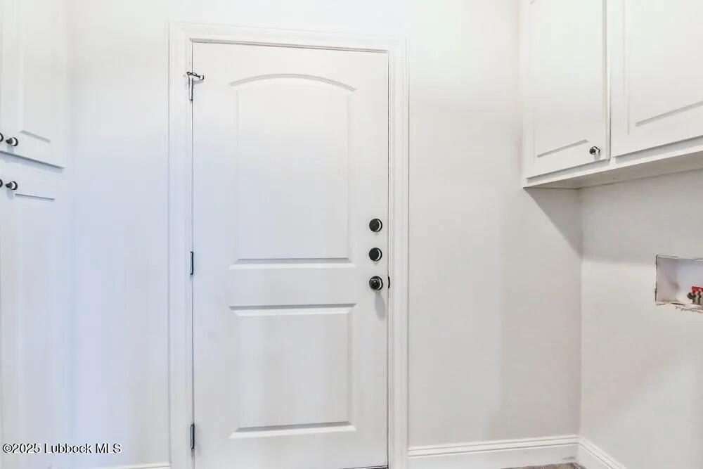 1602 102nd Street Lubbock, TX 79423 - Photo 14 of 16 a bathroom with a shower