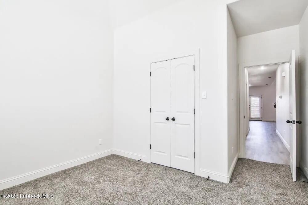 1602 102nd Street Lubbock, TX 79423 - Photo 8 of 16 a view of an empty room