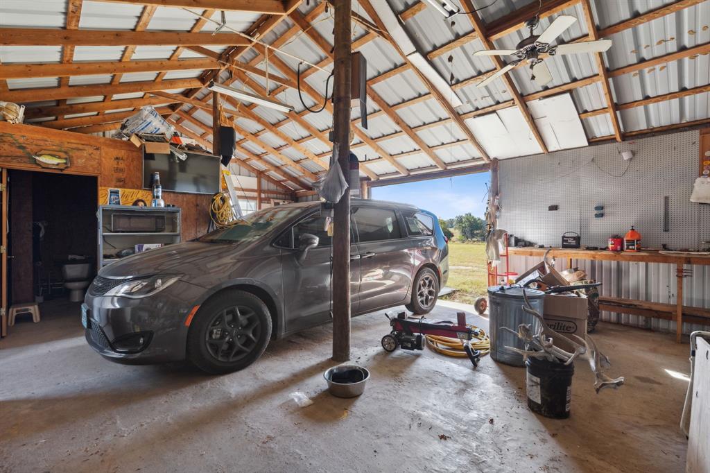 1133 VZ County Road Canton, TX 75103 - Photo 24 of 38 a view of a garage with gym equipment
