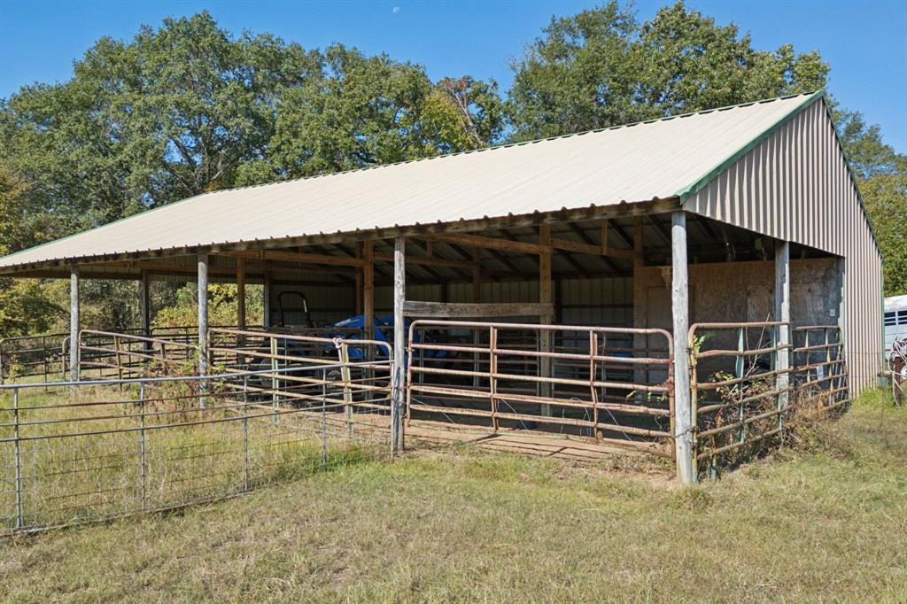 1133 VZ County Road Canton, TX 75103 - Photo 29 of 38 a view of a house with a window and wooden fence