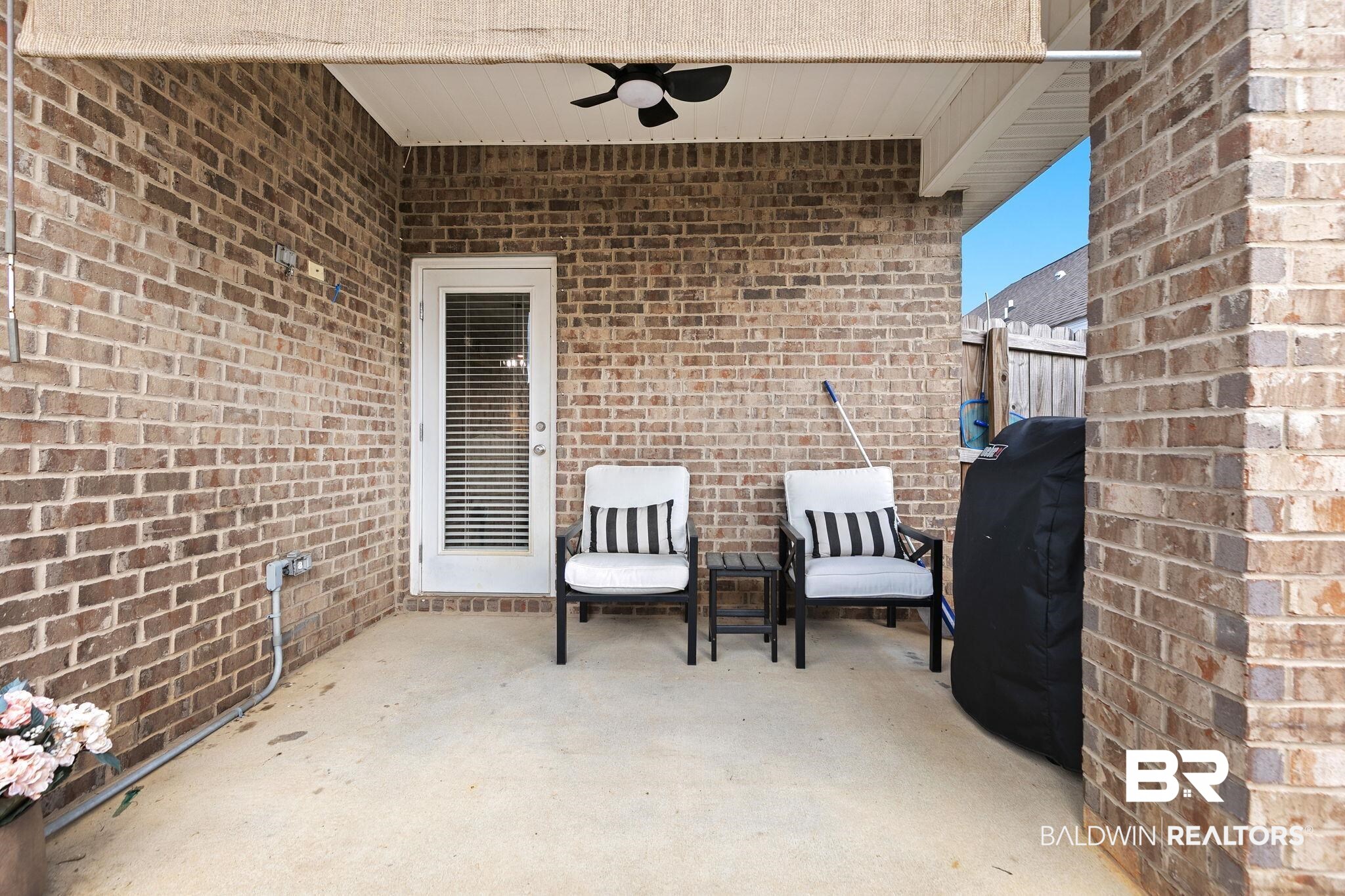 31650 Memphis Loop Daphne, AL 36527 - Photo 41 of 68 View of patio / terrace with a ceiling fan and area for grilling