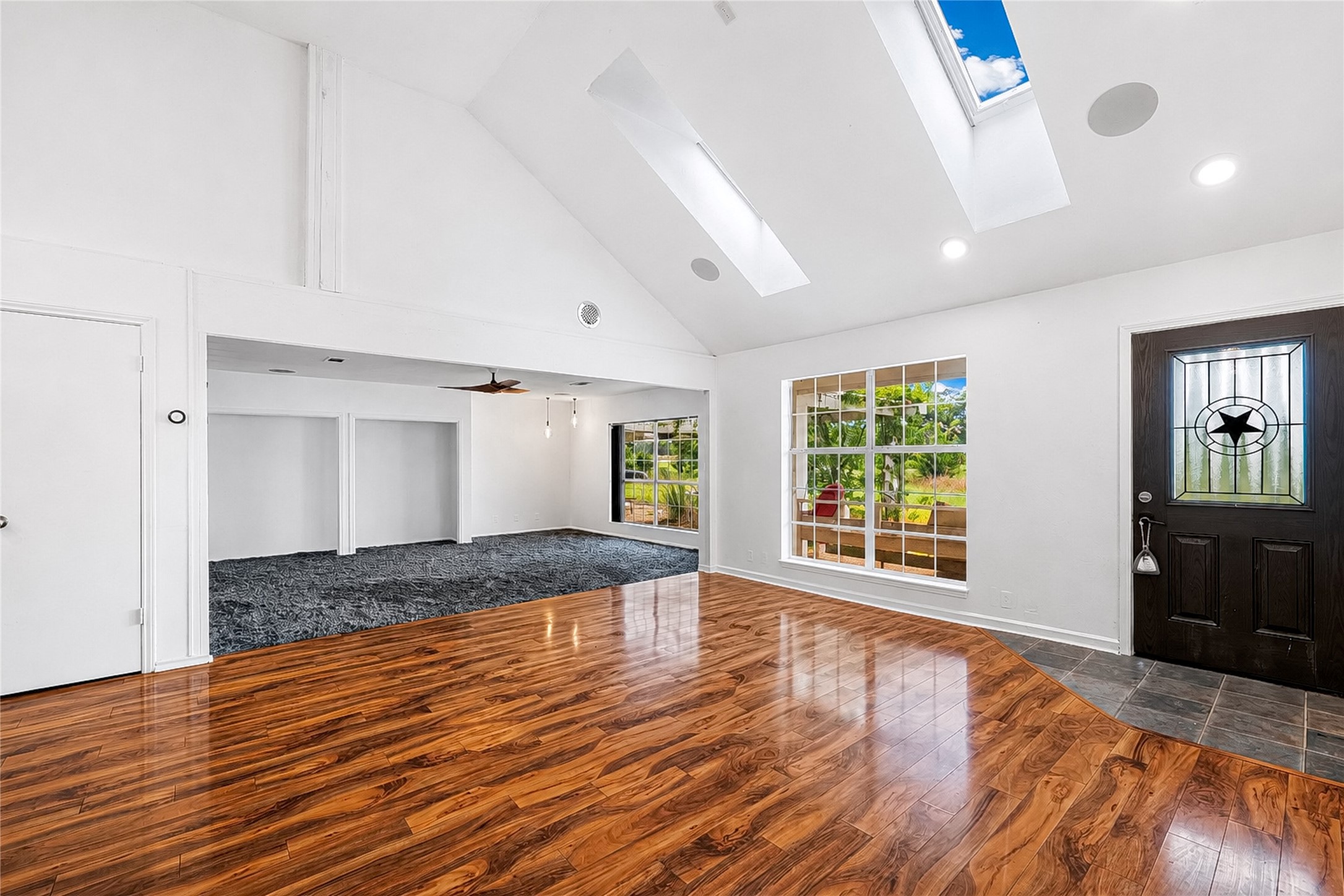 358 Easley Road Smithville, TX 78957 - Photo 6 of 36 Natural light streams into this generously proportioned living area through large windows and overhead skylights.
