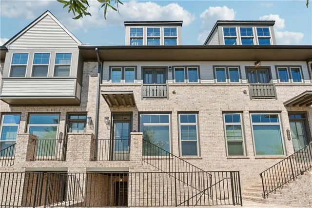 a front view of a house with a balcony