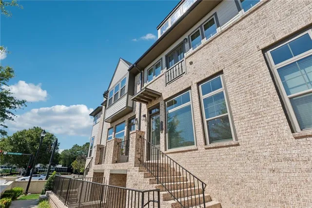 a front view of a building with balcony