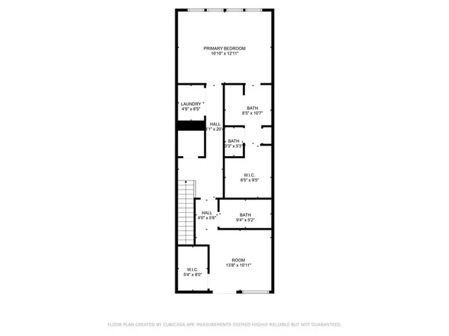 a picture of a bench in front of a wall