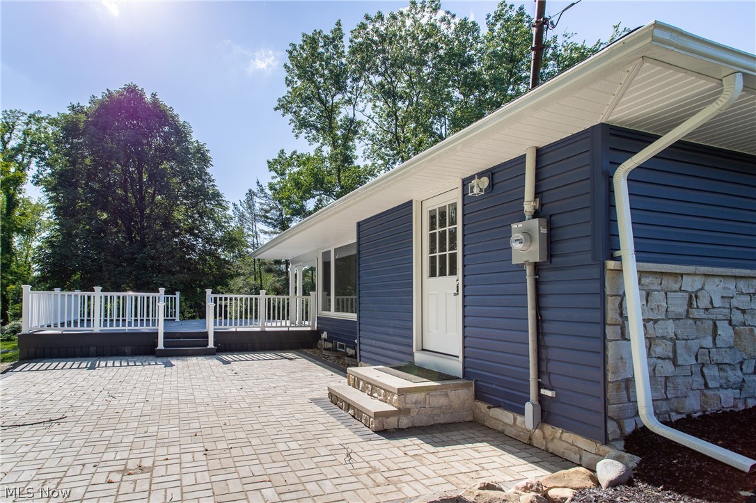 2728 Lander Road Cleveland, OH 44124 - Photo 49 of 50 View of side of home with a patio and a deck