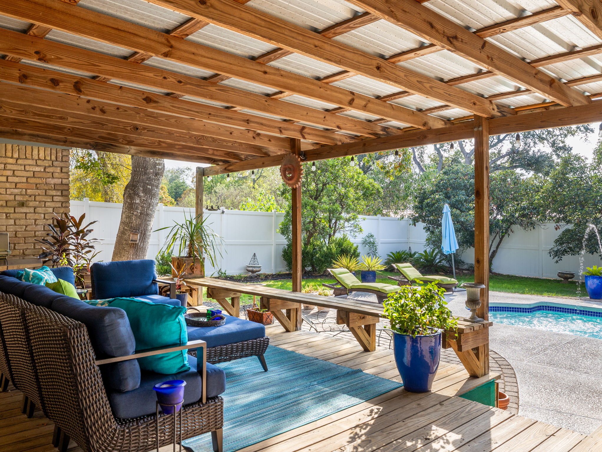 4710 Frontier Trail Austin, TX 78745 - Photo 26 of 32 a view of a patio with furniture and garden view