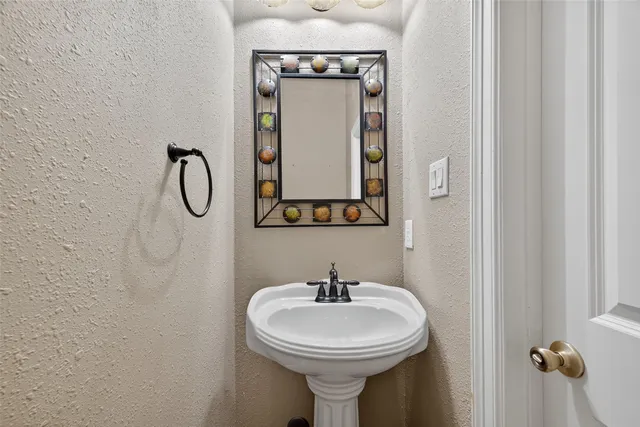 a view of a livingroom with a ceiling fan and window