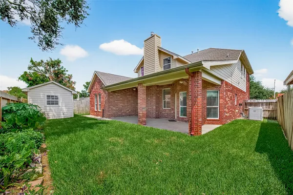 a view of a backyard with a garden