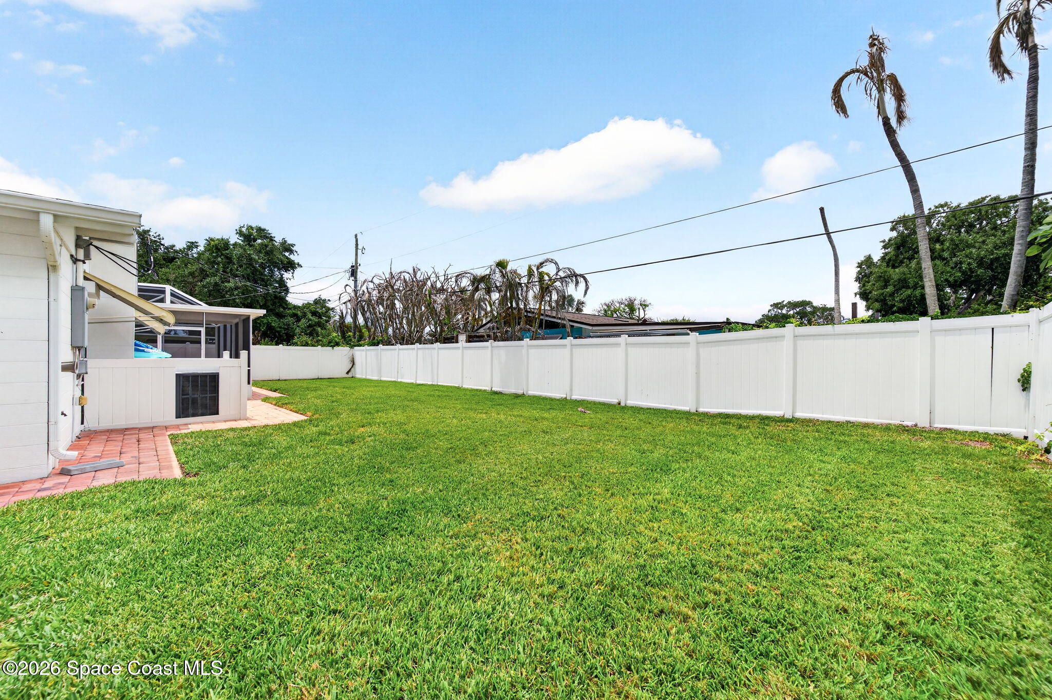 935 Samar Road Cocoa Beach, FL 32931 - Photo 20 of 22 a view of a backyard