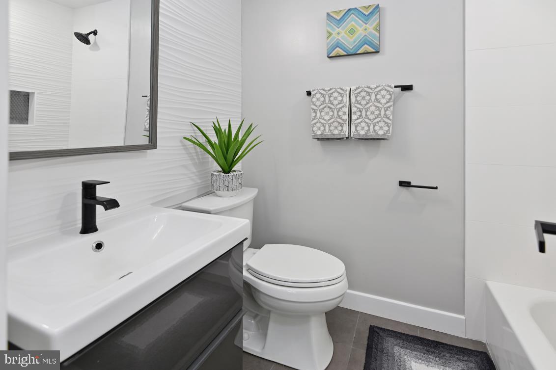 10359 Exeter Road Ocean City, MD 21842 - Photo 17 of 45 Master bath with Porcelanosa Bath and floor tiles