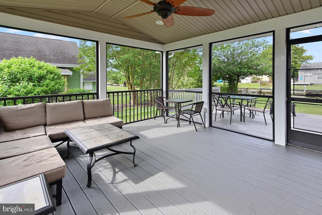 10359 Exeter Road Ocean City, MD 21842 - Photo 31 of 45 Relaxing sunroom with water view