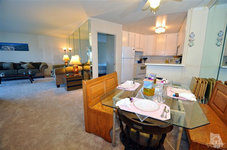 2901 Peninsula Road, Unit 331 Oxnard, CA 93035 - Photo 5 of 21 a view of a dining room with furniture