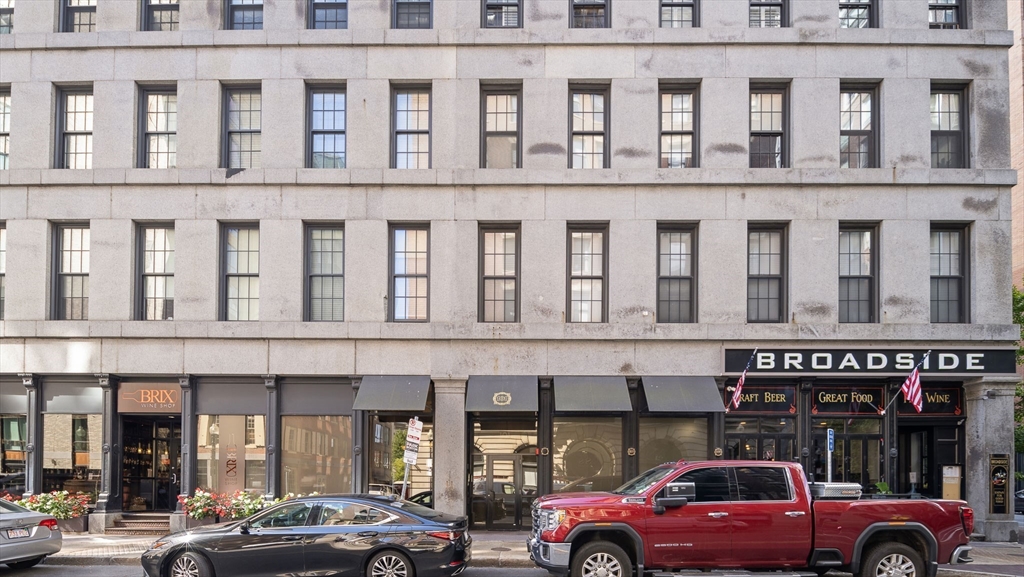 99-105 Broad Street, Unit 4F Boston, MA 02110 - Photo 15 of 16 a view of a car parked in front of building