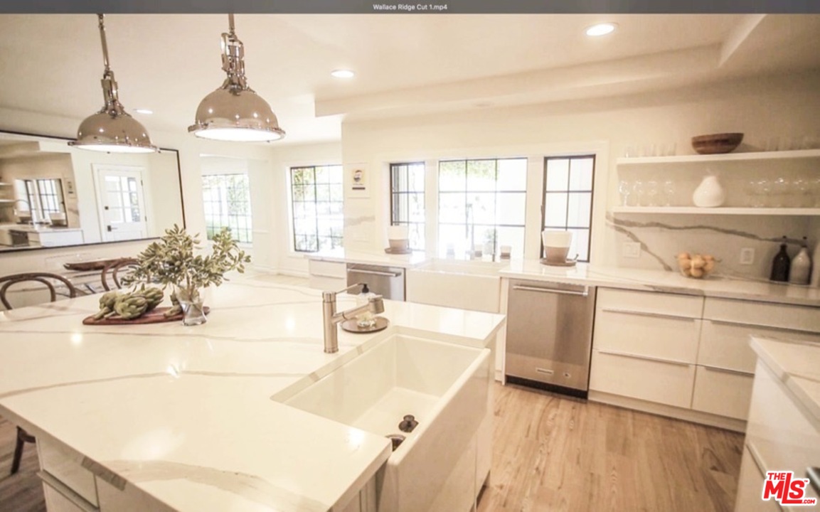 1075 Wallace Ridge Beverly Hills, CA 90210 - Photo 13 of 35 a very nice looking room with a large window